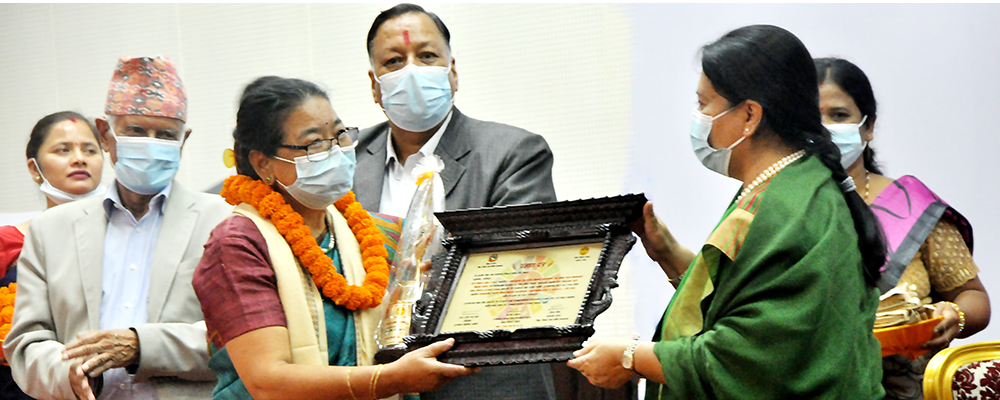 “An award from Jeeban Bikas Samaj recognizing the REED Nepal’s contribution in SDGs.”